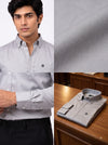 Men's grey plain shirt in cotton fabric featuring a classic fit and button-down collar