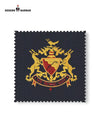 Bhati Coat Suit for Men featuring a royal emblem on premium fabric swatch from Modern Marwar
