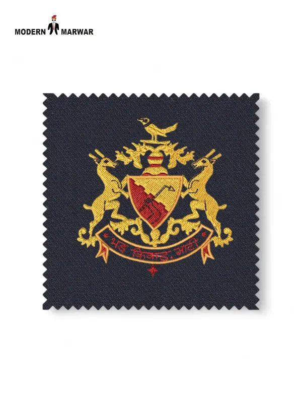 Bhati Coat Suit for Men featuring a royal emblem on premium fabric swatch from Modern Marwar