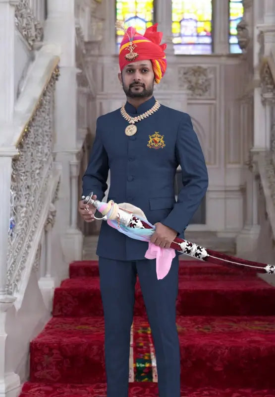 Stylish Bhati Coat Suit for Men in navy blue with traditional accessories and elegant details