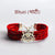 Bhati logo moli bracelet in red with intricate braided design and a silver emblem