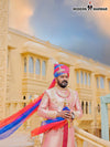 Elegant designer Angarkha sherwani online with intricate embellishments and vibrant sash for special occasions
