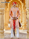 Elegant designer Angarkha sherwani outfit in peach with intricate embroidery and traditional styling