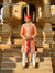 Stylish designer Angarkha sherwani outfit in orange with traditional embellishments for festive occasions