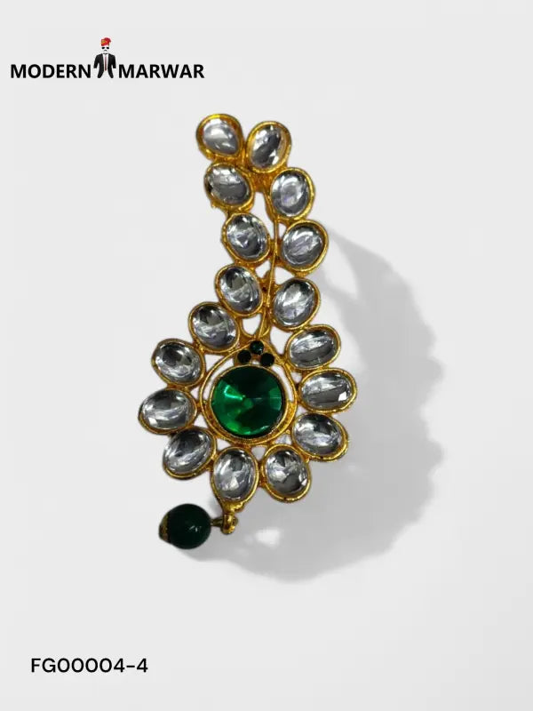 Elegant designer brooch for wedding attire with green stones and intricate gold detailing