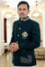 Stylish MODERN MARWAR designer men’s coat suit in dark green with embroidered details and pocket design