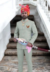 Elegant Eagle Logo Jodhpuri Suit in Light Green with Traditional Accessories and Turban