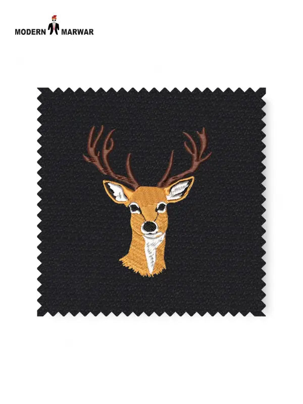 Sample fabric featuring an embroidered deer logo for the embroidered deer logo coat suit
