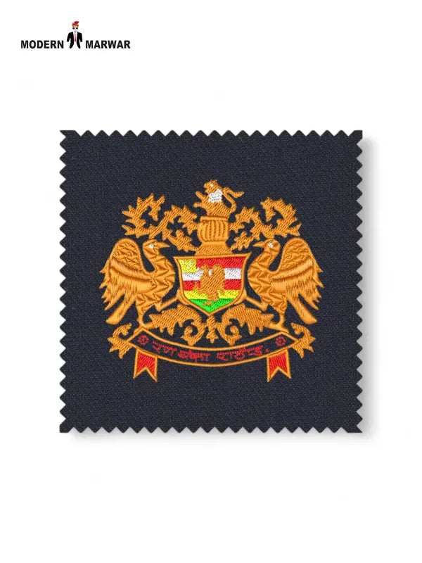 Embroidered logo Jodhpuri design featuring a regal crest on textured fabric
