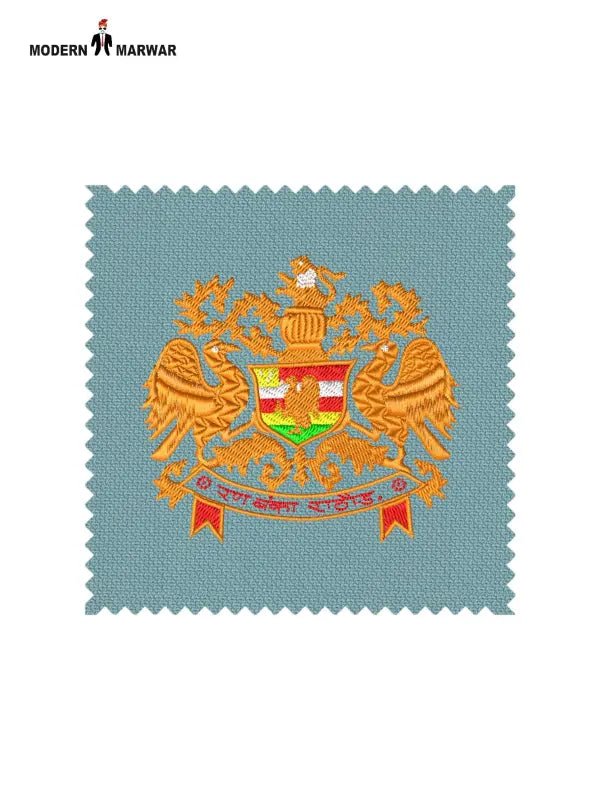 Embroidered logo Jodhpuri patch showcasing intricate design with vibrant colors on a light blue background