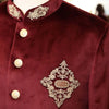Exclusive men's designer coat in burgundy velvet with intricate embroidery and decorative buttons