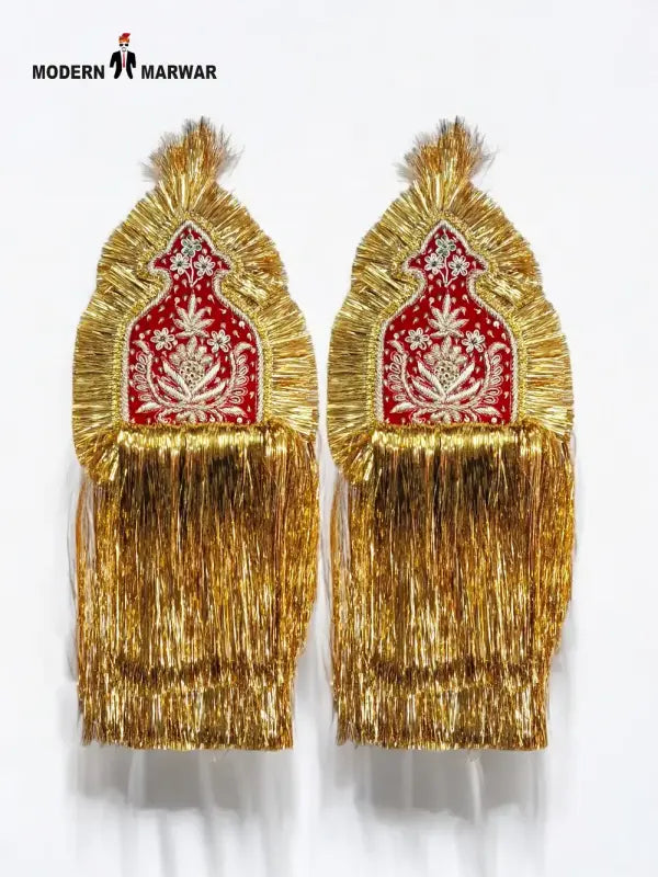 Gold embroidered epaulettes with intricate designs and fringe detailing for traditional outfits