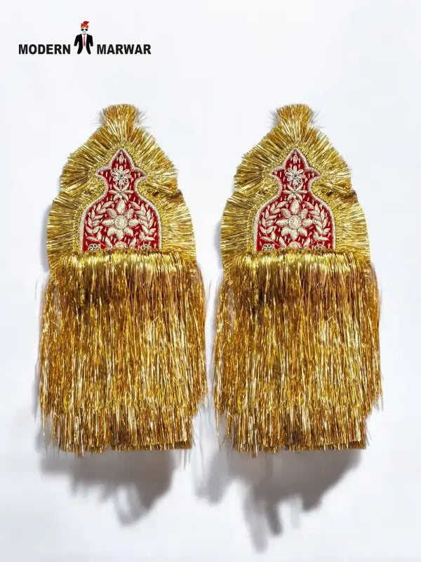 Gold fringe shoulder decor with intricate red embroidery for traditional attire from Modern Marwar