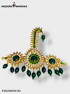 Elegant gold green enamel brooch with intricate floral design and hanging green beads