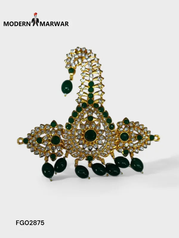 Elegant golden kundan brooch jewelry featuring intricate design and green gemstone accents