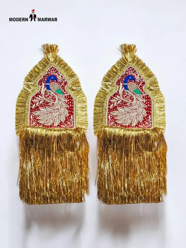 Golden Peacock Epaulettes by Modern Marwar with intricate detailing and fringed design