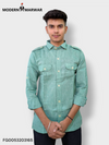 Modern Marwar green casual linen shirt with buttoned pockets and rolled sleeves for a stylish look