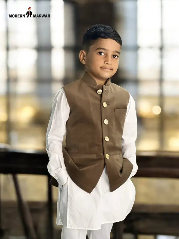 Stylish kids velvet koti in brown, paired with a white kurta for traditional celebrations