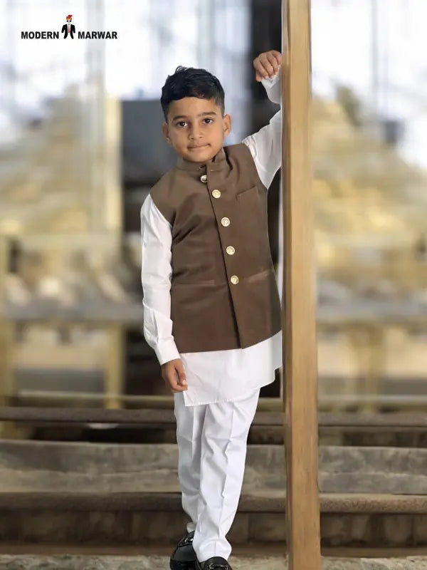 Stylish kids velvet koti in brown, paired with a white kurta and pants for festive occasions