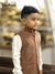 Smart boy wearing Kids velvet koti in brown with white shirt and stylish buttons for special occasions