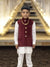 Elegant kids velvet koti in maroon with button details and layered over a white kurta for festive occasions