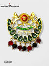 Luxury brooch for sherwani featuring intricate design with green and red gemstones