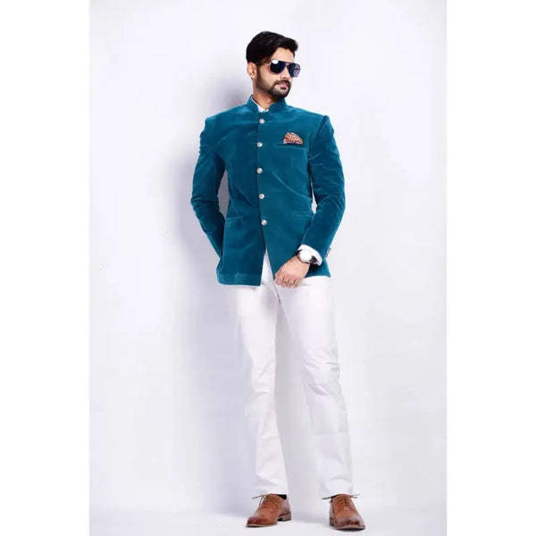 Luxury men's velvet coat in teal, featuring a stylish design and perfect for formal occasions