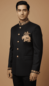 Formal men's Jodhpuri coat with elephant logo in black and intricate gold detailing from Modern Marwar