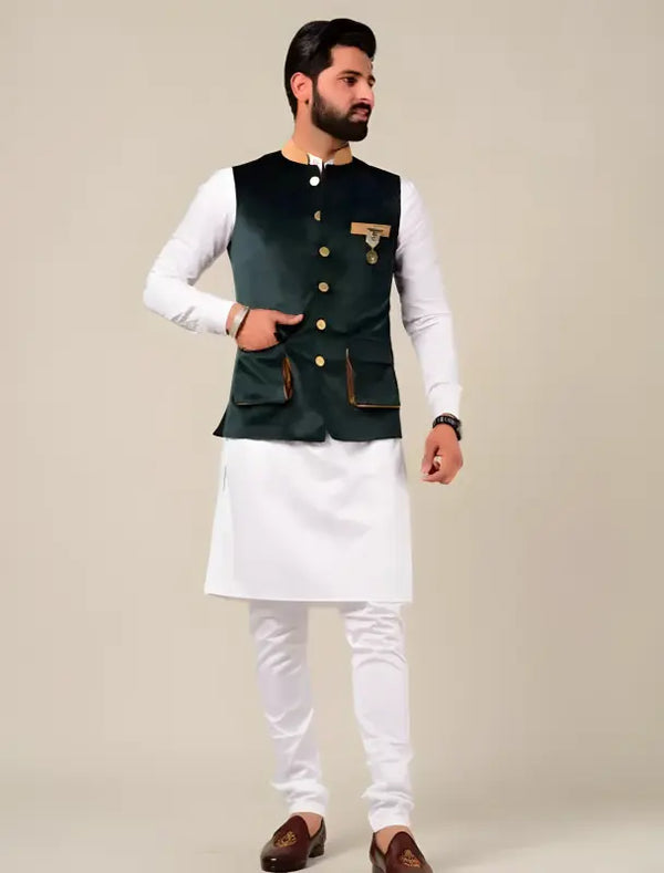 Stylish men's kurta pajama set featuring a dark green waistcoat and white kurta for festive occasions