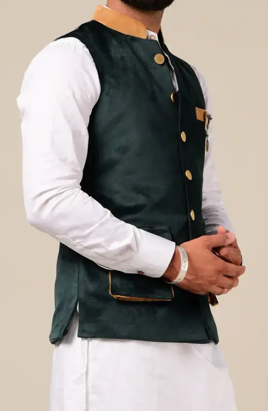 Stylish men's kurta pajama set with a green jacket, perfect for festive occasions