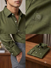 Men's plain shirt in olive green cotton, styled on a mannequin and flat lay for versatile looks