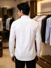 Men's plain shirt in white cotton fabric, back view showing sleek design