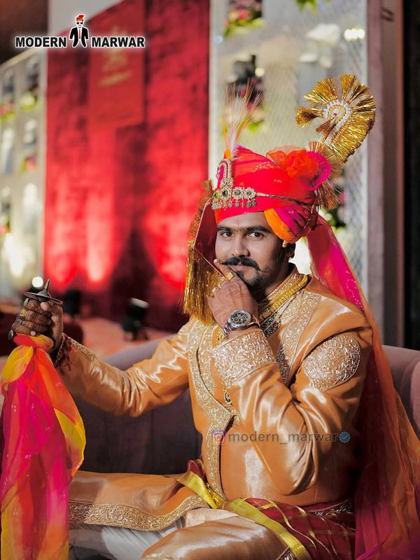 Stylish men's sherwani angarkha in gold with ornate embroidery, perfect for festive occasions