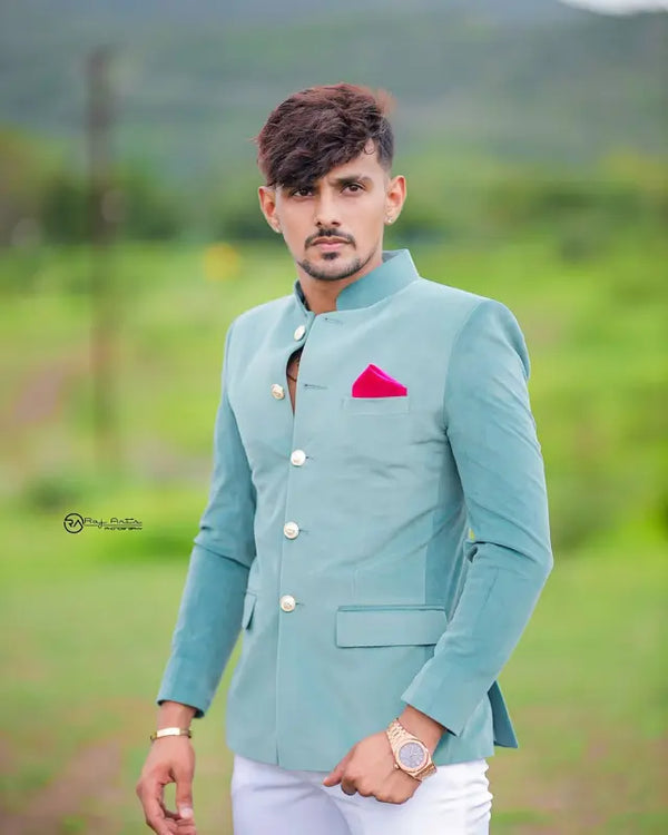 Modern Marwar men's wedding coat suit in light blue with stylish buttons and a pink pocket square