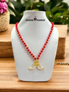 Colorful bead necklace with red beads and a gold pendant design from Modern Marwar