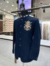 Modern Marwar Men's Jodhpuri Suit featuring a stylish embroidered logo in navy blue for formal occasions