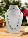 Stylish multicolor bead necklace featuring red, green, and white beads for vibrant accessories