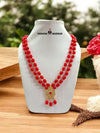 Red beaded necklace with layered strings and an ornate centerpiece from Modern Marwar