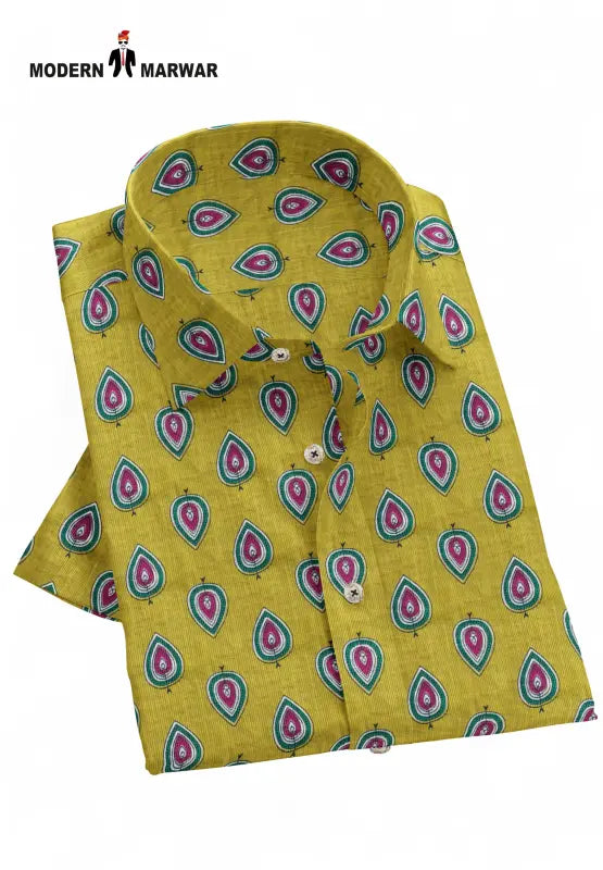 Sanganeri printed shirt by Modern Marwar featuring vibrant leaf patterns on a yellow background