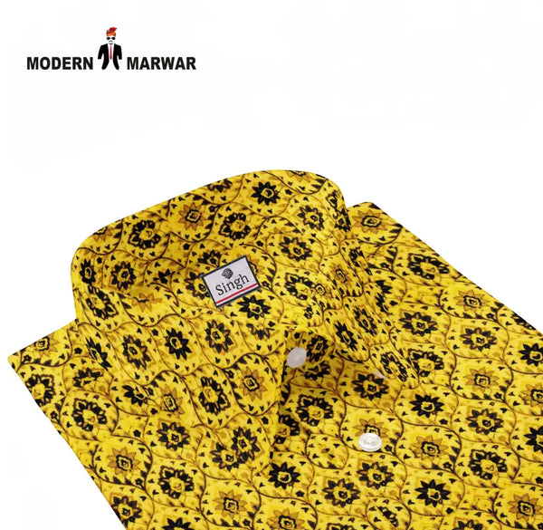 Yellow printed shirt for men by Singh with intricate black floral pattern and button-up collar