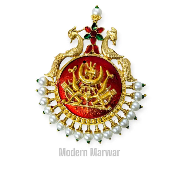 Ornate traditional sarpech jewelry with intricate gold designs and pearl accents