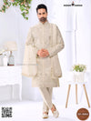 Elegant wedding groom sherwani combo in ivory with intricate embroidery and matching accessories