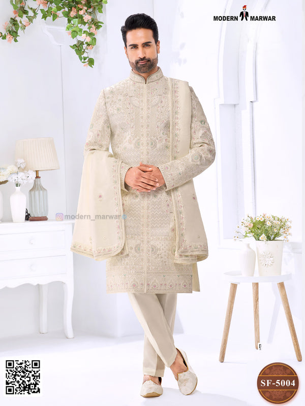 Elegant wedding groom sherwani combo in ivory with intricate embroidery and matching accessories