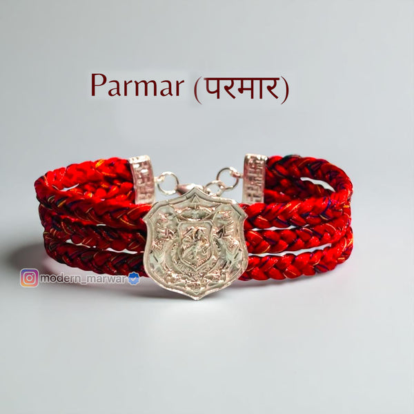 Parmar logo moli bracelet in red with a silver charm for stylish wristwear