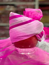 Piyor Safa traditional headwear in vibrant pink with elegant draping details for cultural celebrations