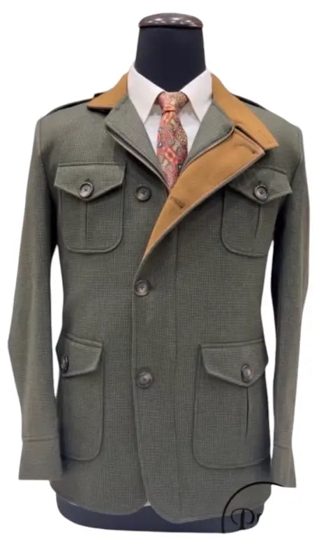 Stylish green premium Jodhpuri suit with elegant design and multiple pockets for formal occasions