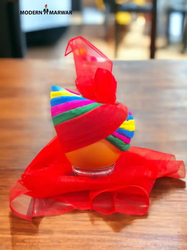 Vibrant premium safa turban from Modern Marwar with colorful stripes and elegant draping