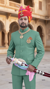 Elegant Rajputi Jodhpuri Suit for Men in Green with Traditional Accessories and Turban