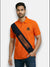M'TSHIRTS in orange cotton showing a model wearing shekhawat lobo tshirts from SINGH