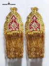 Gold fringe sherwani accessory with intricate red embroidery for festive occasions